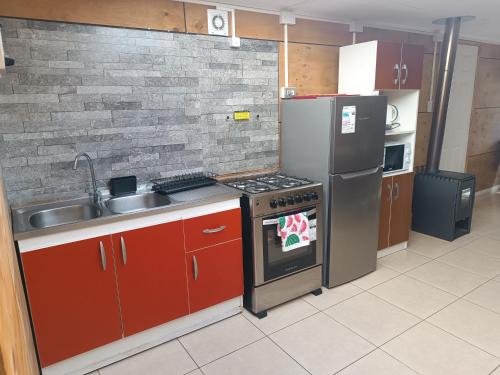 Kuchyň nebo kuchyňský kout v ubytování Cabaña Renacer a 10 min del aeropuerto