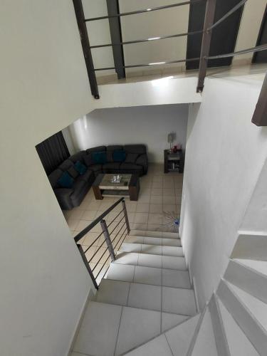 a view of a living room with a couch at Casa privada Mediterráneo in La Paz