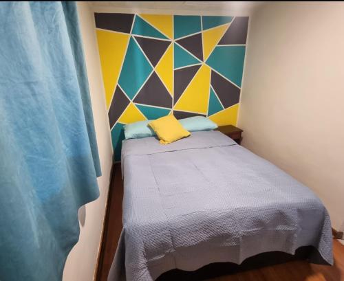 Postel nebo postele na pokoji v ubytování El Chalet del Gato, apartamento 1