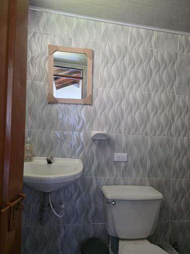 Et badeværelse på Munay Tota Signature