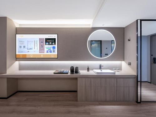 TV/trung tâm giải trí tại Orange Crystal Hotel Nanjing Drum Tower