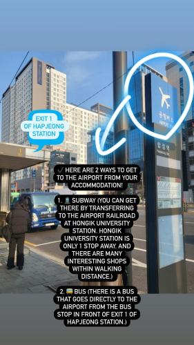 a sign on the side of a city street at Healing House in Seoul