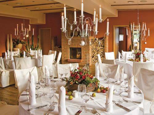 Un restaurante u otro lugar para comer en Rosendomizil