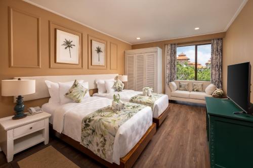 Postel nebo postele na pokoji v ubytování Prime Plaza Hotel Sanur – Bali