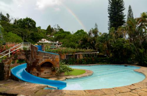 Bazén v ubytování Condado de Casa Grande nebo v jeho okolí