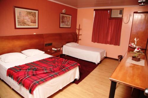 Ένα ή περισσότερα κρεβάτια σε δωμάτιο στο Atlas Hotel Residence