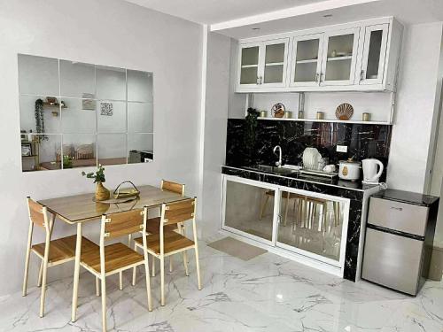 Cuisine ou kitchenette dans l'établissement 3Ks Transient House - Kyle Suite