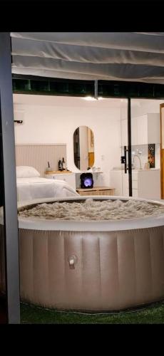 a view of a bedroom with a large bed at Atacama container in Brasília