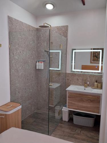 a bathroom with a shower and a sink at Elks Nook Retreat - Luxurious Escape - Perth Hills in Byford