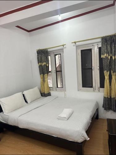 Krevet ili kreveti u jedinici u okviru objekta Hotel flora