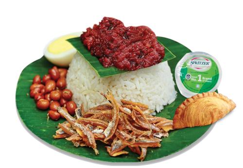 a green plate of food with rice and meat at E-Home Kulai in Kulai