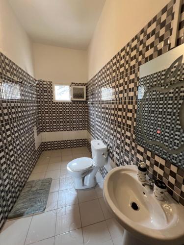 O baie la Appartement Mbootaay