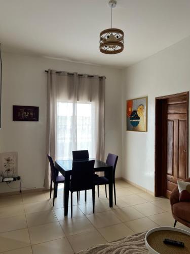 O zonă de relaxare la Appartement Mbootaay