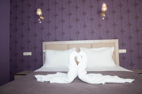 Eridana Hotelにあるベッド