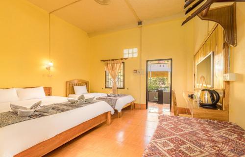 En eller flere senge i et værelse på Nong Khiaw Meexai Sunset View