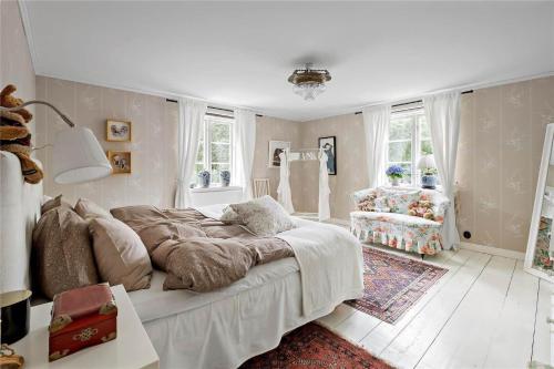 Giường trong phòng chung tại HAL484-Unnaryd-Yas-108