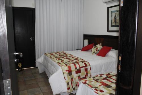 Hotel Dom Henriqueにあるベッド
