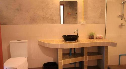 Koupelna v ubytování Phumanee Home Hotel