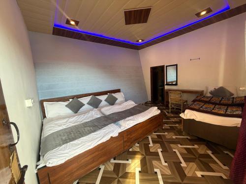 En eller flere senge i et værelse på The Vintage Classic