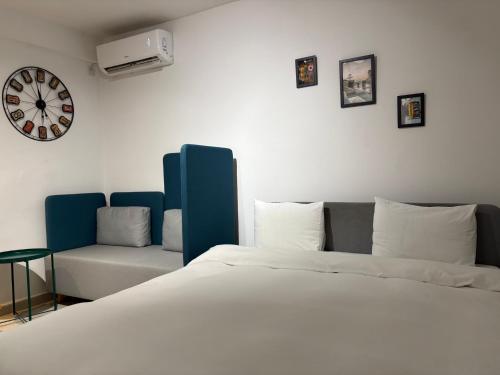 Llit o llits en una habitació de City Centre One