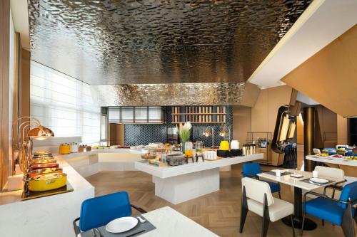 Khu vực ghế ngồi tại Fairfield by Marriott Qingdao West Coast