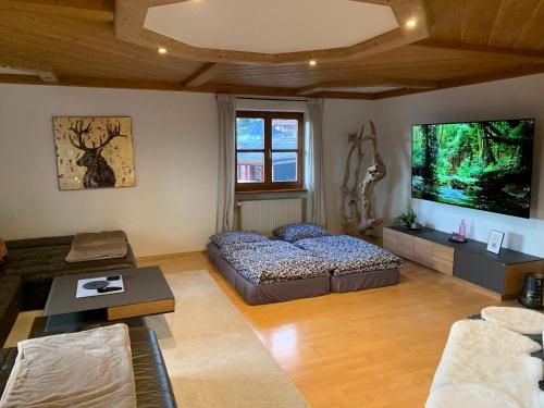 Postel nebo postele na pokoji v ubytování Habicht Ferienhaus