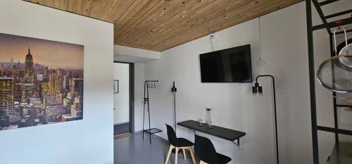 Et tv og/eller underholdning på RS Apartments