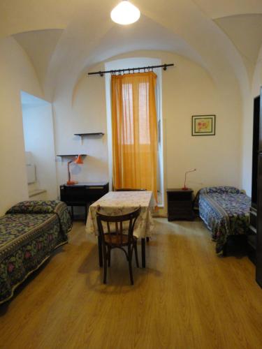 Posteľ alebo postele v izbe v ubytovaní Casa Mariotti