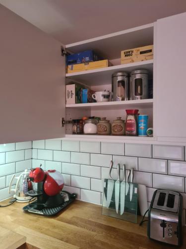 a kitchen with a mixer on a kitchen counter at Large twin room at Fir Tree Lodge, Shirehampton in Bristol