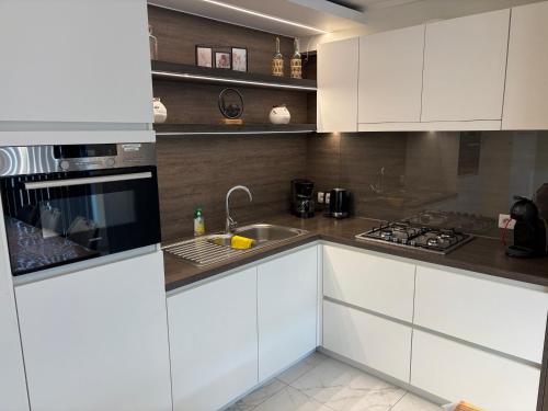 Køkken eller tekøkken på Tantor 1 zeezicht