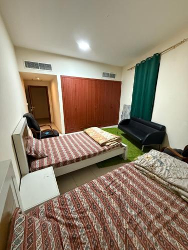Room with shared 2 Whasroom in Ajman