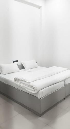 Giường trong phòng chung tại Saran Homestay