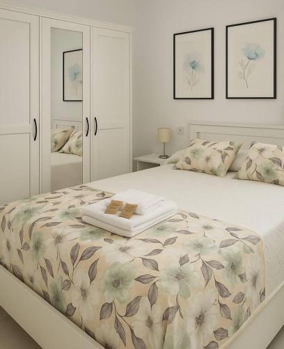 Giường trong phòng chung tại Alojamiento Baeza California 2A