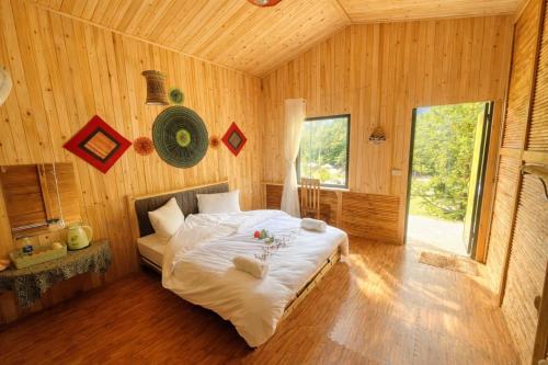 Postel nebo postele na pokoji v ubytování Sapa Retreat Homestay & Restaurant