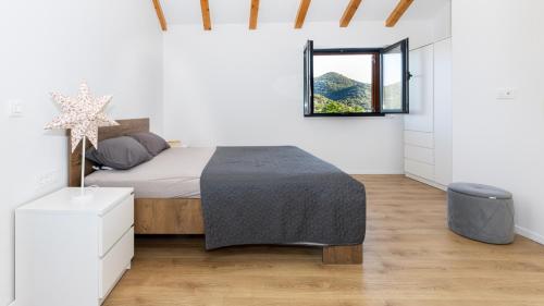 Postel nebo postele na pokoji v ubytování Villa Teuta by Villas Guide