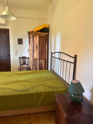 En eller flere senge i et værelse på Το Ράντζο του Λυμπέρη