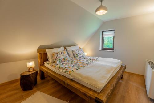 En eller flere senge i et værelse på Siedlisko Pierszczewko