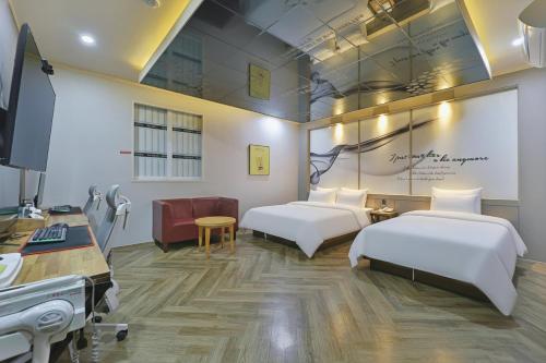Posteľ alebo postele v izbe v ubytovaní Palace Hotel
