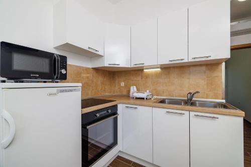 Malerisches Studio-Apartment mit Meerblick, Privatparkplatz, Klima