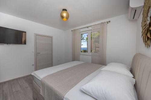Komplett renoviertes Apartment nur 500 Meter zum Strand mit Grill, Smart-TV, Wäschetrockner