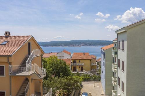 Cozy Apartment mit Meerblick, Privatparkplatz, Garten, Klima, WiFi
