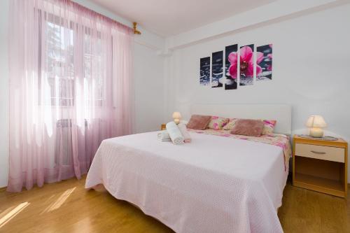 Lauschiges Apartment nur 400 Meter zum Strand mit Parkplatz, Waschmaschine, Garten