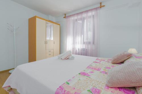 Lauschiges Apartment nur 400 Meter zum Strand mit Parkplatz, Waschmaschine, Garten