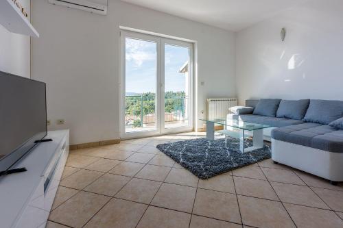 Lauschiges Apartment nur 250 Meter zum Strand mit Meerblick, Privatparkplatz, WiFi