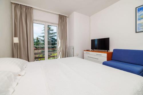 Beschauliches Apartment nur 300 Meter zum Strand mit Garten und Grill