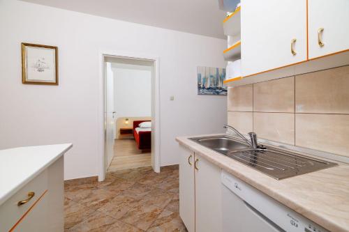 Malerisches Apartment mit traumhaften Meerblick, Grillplatz, Garten, Waschmaschine