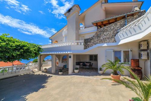 Malerisches Apartment mit traumhaften Meerblick, Grillplatz, Garten, Waschmaschine