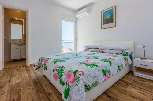 Modernes Apartment nur 100 Meter zum Strand mit Grillplatz, Meerblick, Klima