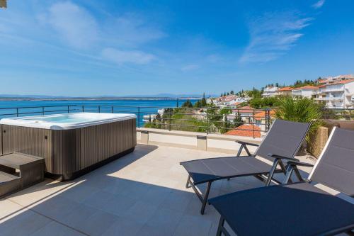 Traumhaftes Apartment nur 100 Meter zum Strand mit herrlichem Meerblick, Sauna, Whirlpool