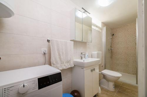 Idyllisches Apartment nur 200 Meter zum Strand mit Privatparkplatz, Klima, Waschmaschine